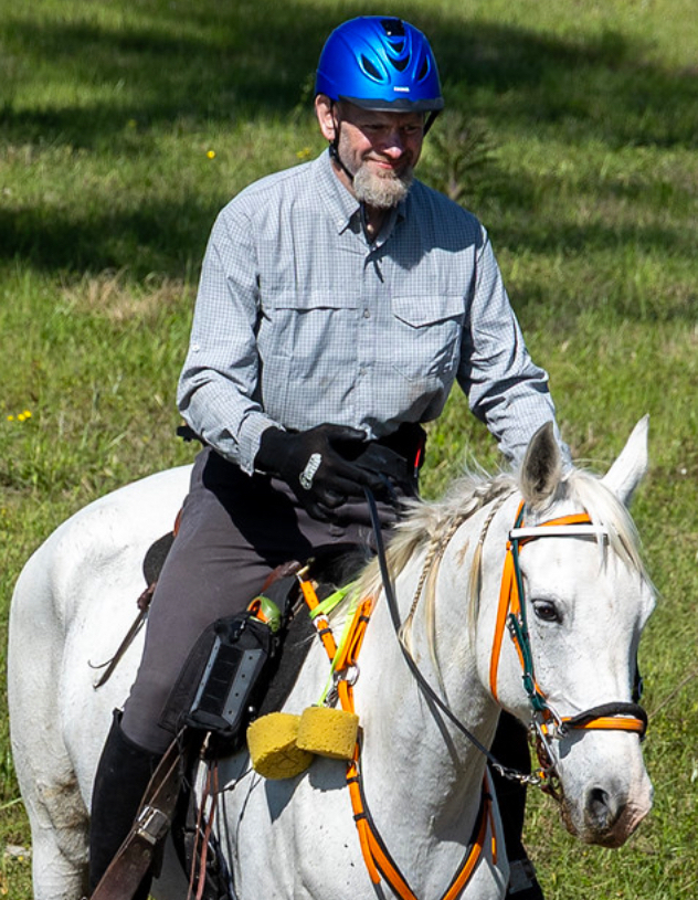 a man riding a horse